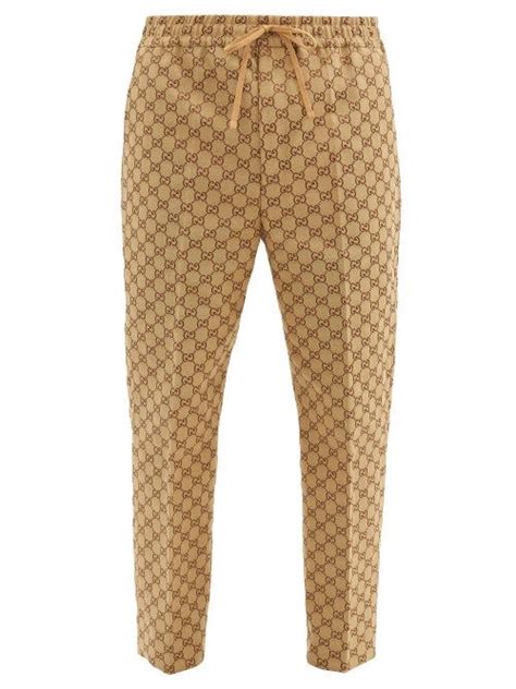 pantaloni gucci uomo beige|Altro.